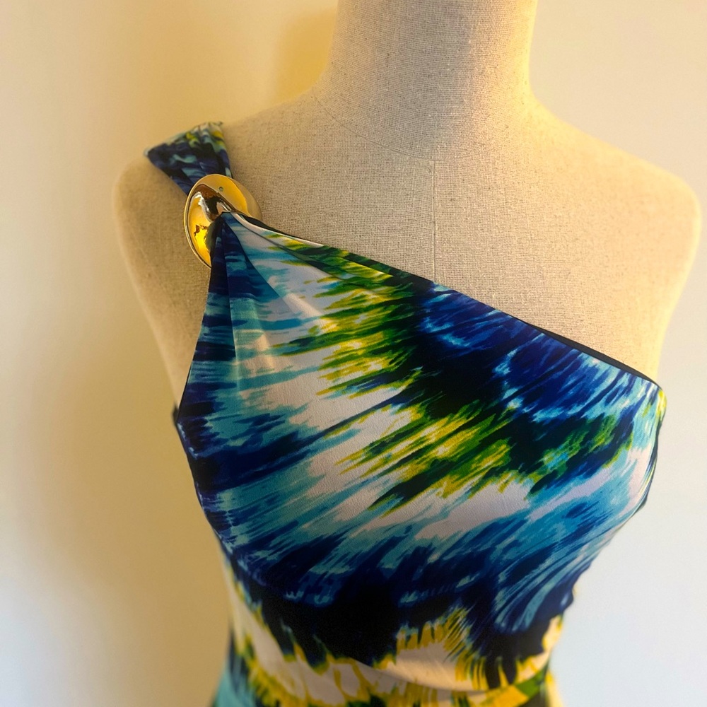 Cache one shoulder long tropical dress with slit on the side.